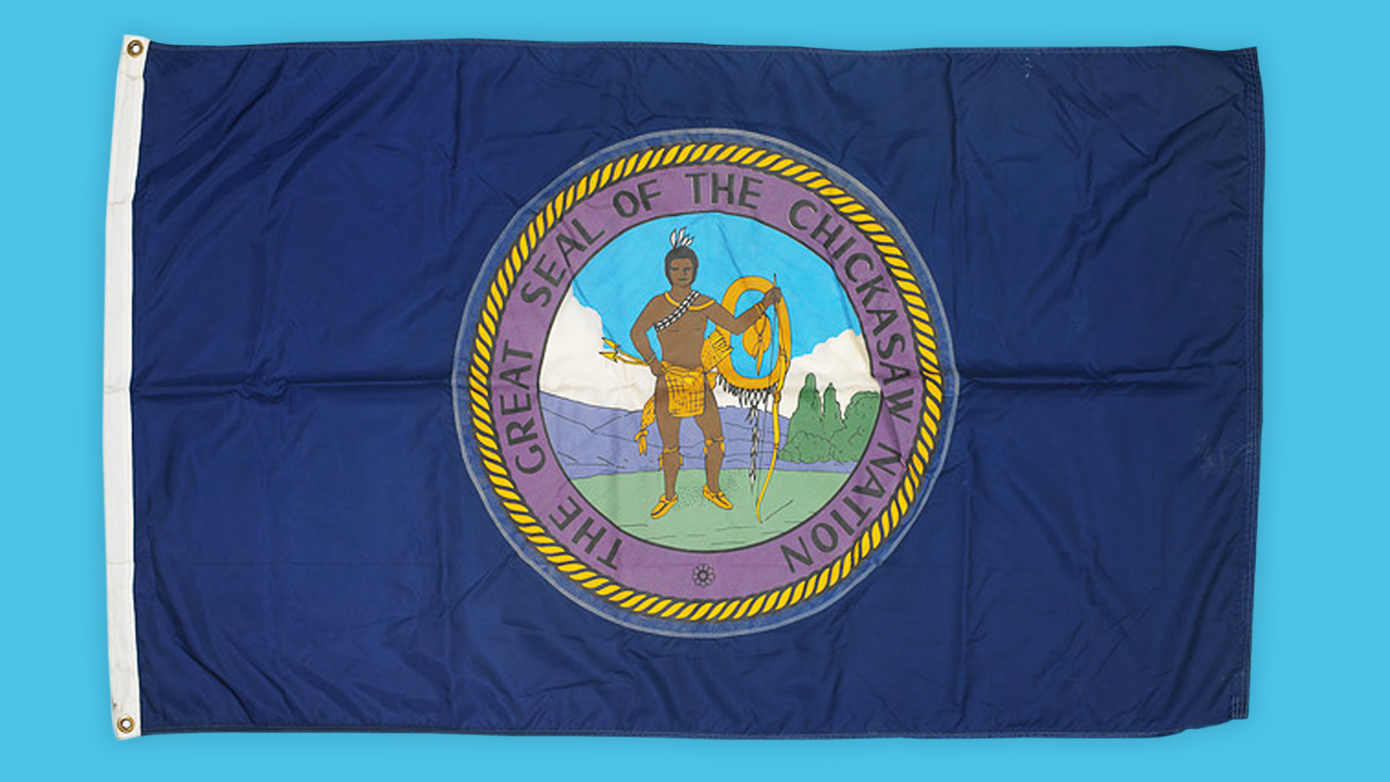 The flag of the Chickasaw Nation on a bright blue background