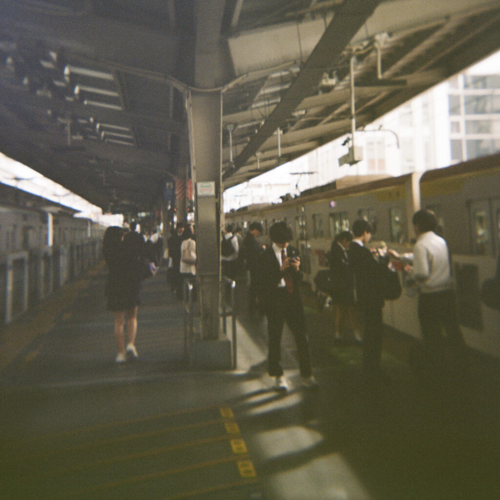 A medium format photograph of the Nakameguro train station in Tokyo
